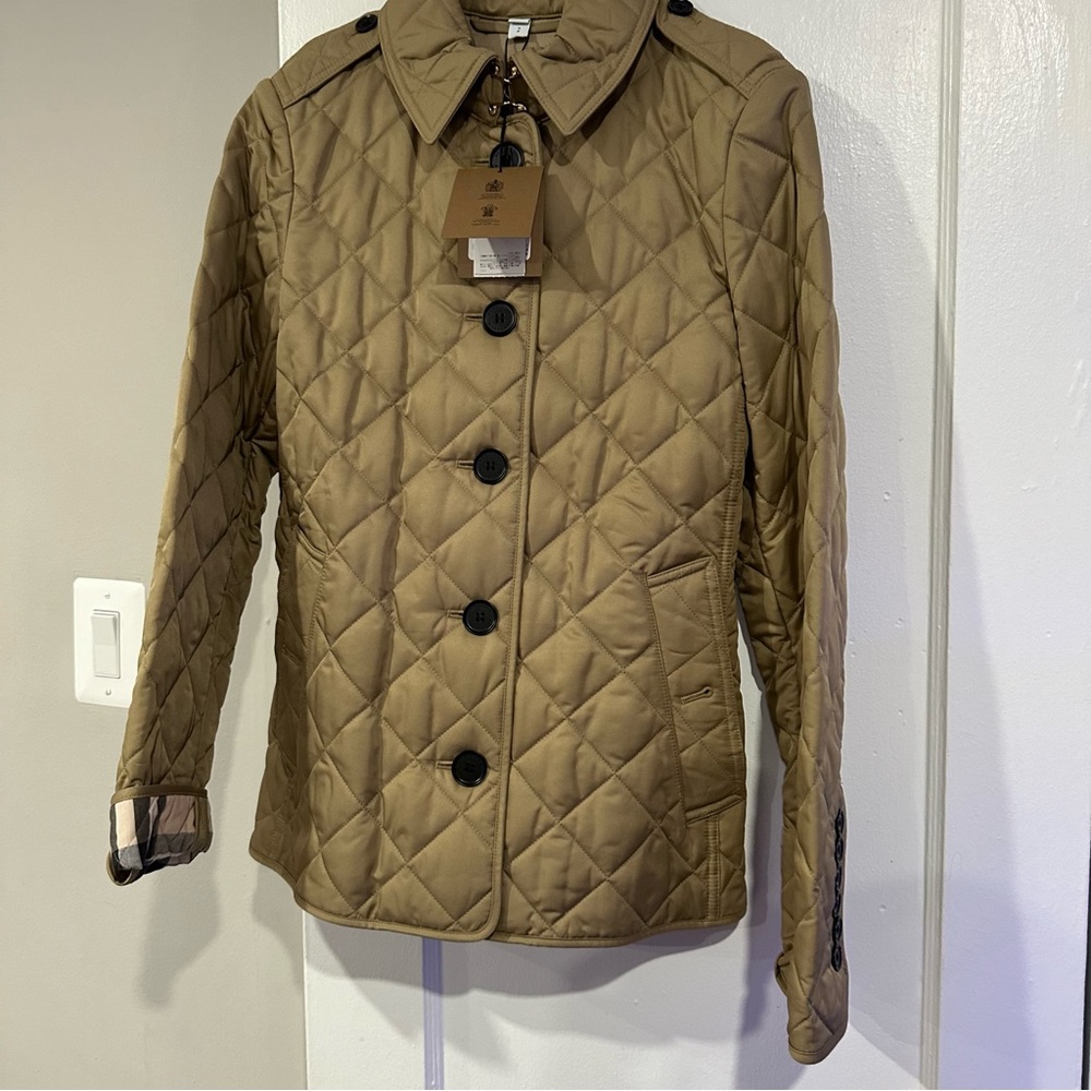 New Burberry Brit Jacket with Tags. Very nice jacket and a great deal!!!